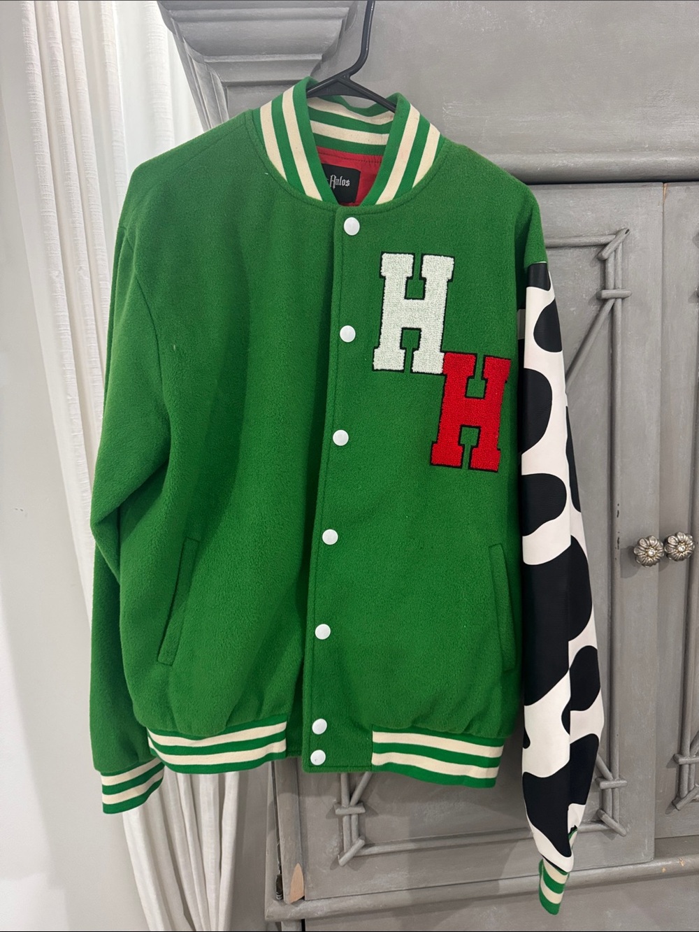 Green Varsity Jacket with Contrasting Polka Dot Sleeve